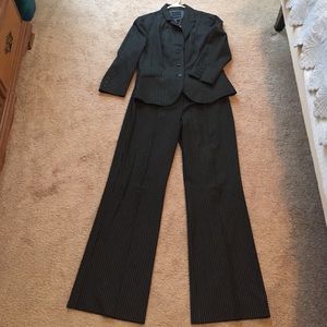 Black with white pinstripe suit jacket and pants